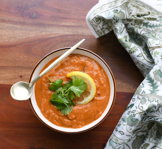 Creamy soup served with crusty bread